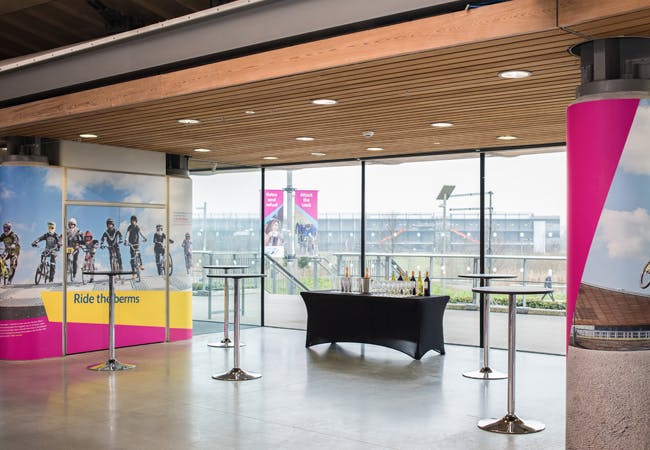 Modern event space with high-top tables at Lee Valley VeloPark for networking events.