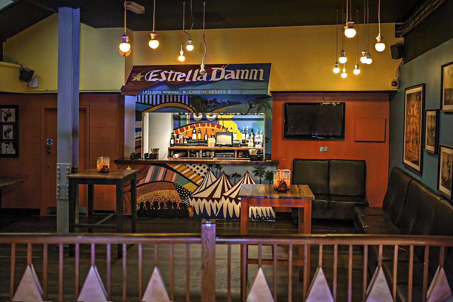 Vibrant Trapeze Bar Mezzanine with colorful decor for networking events and cocktail receptions.