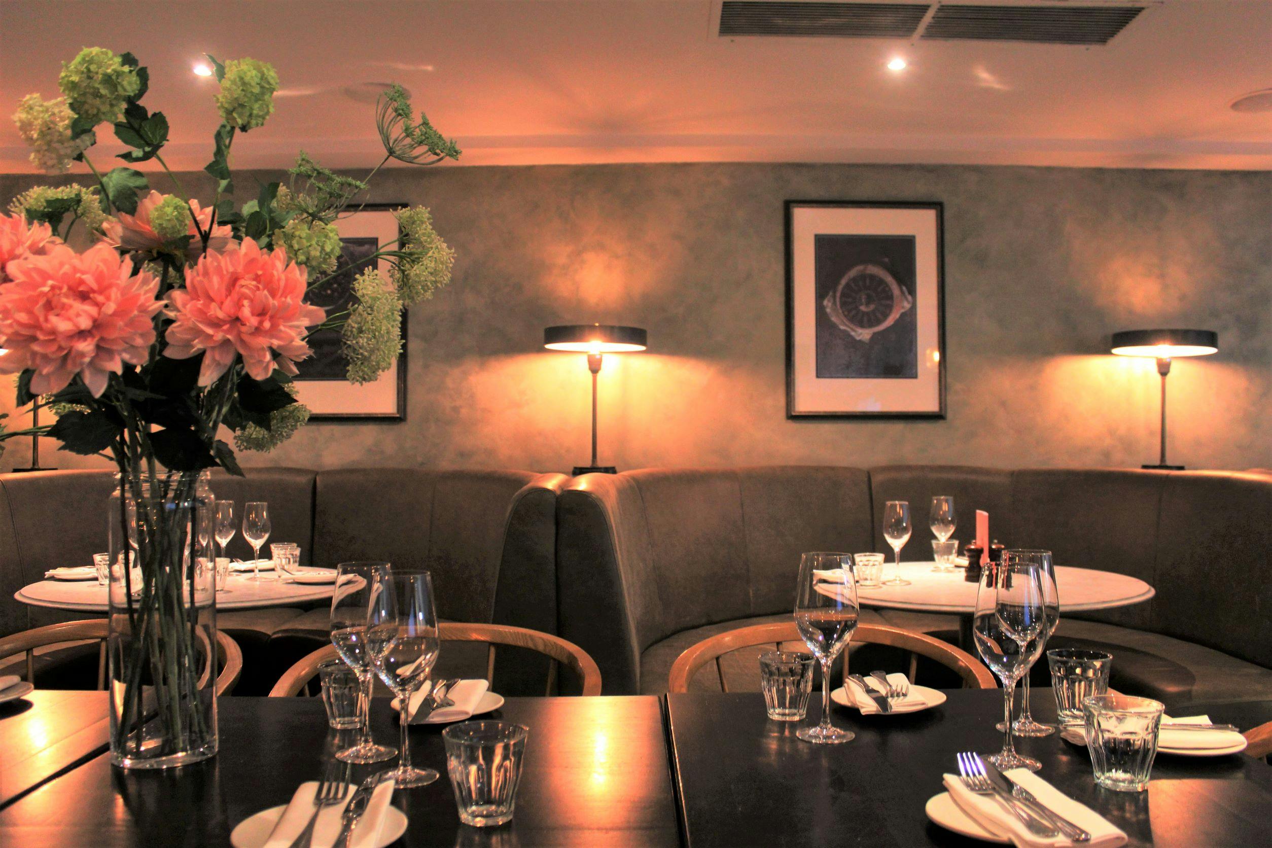 Semi-private Mezzanine at Brasserie Blanc, elegant dining for corporate events and gatherings.