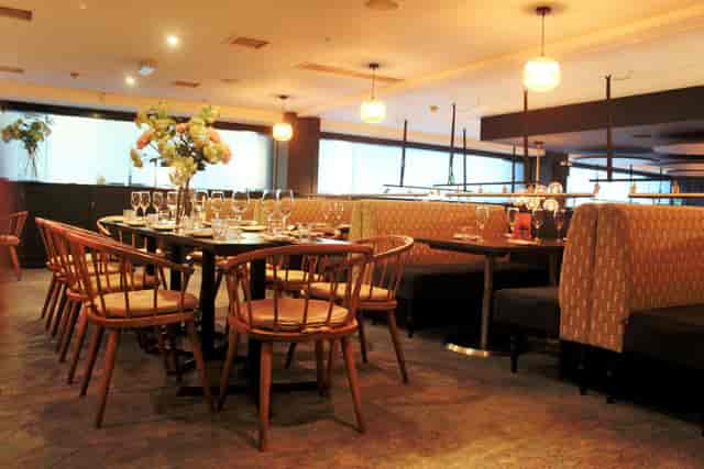 Semi-private Mezzanine at Brasserie Blanc, elegant dining for corporate events and gatherings.