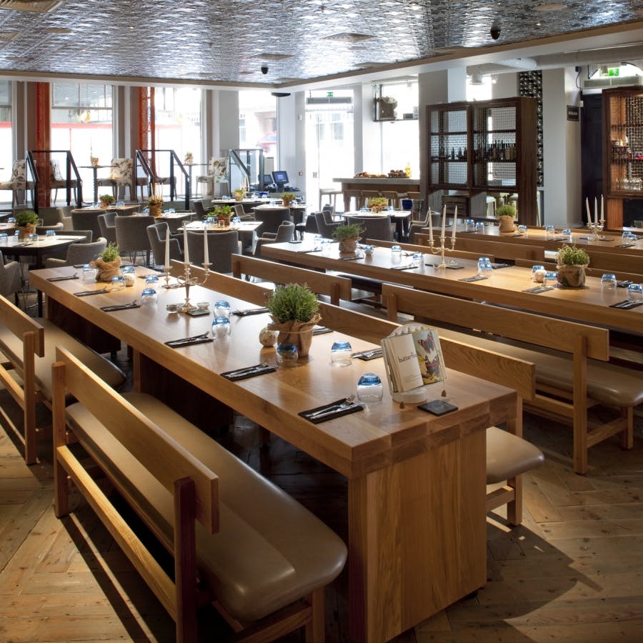 Spacious dining area at The Anthologist, perfect for networking events and gatherings.