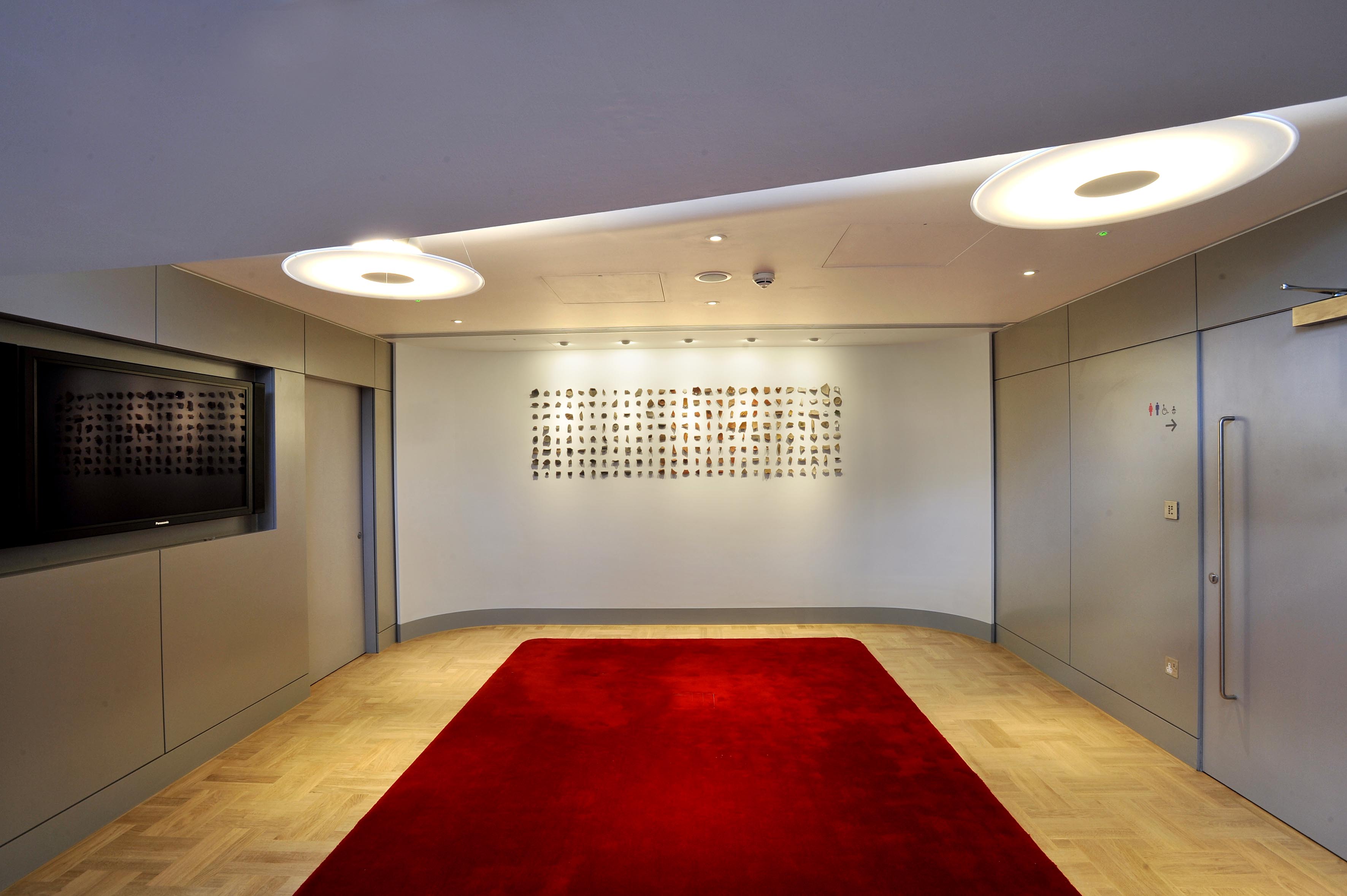 Terrace Boardroom entryway with polished wood floor and red carpet for elegant events. - Banner