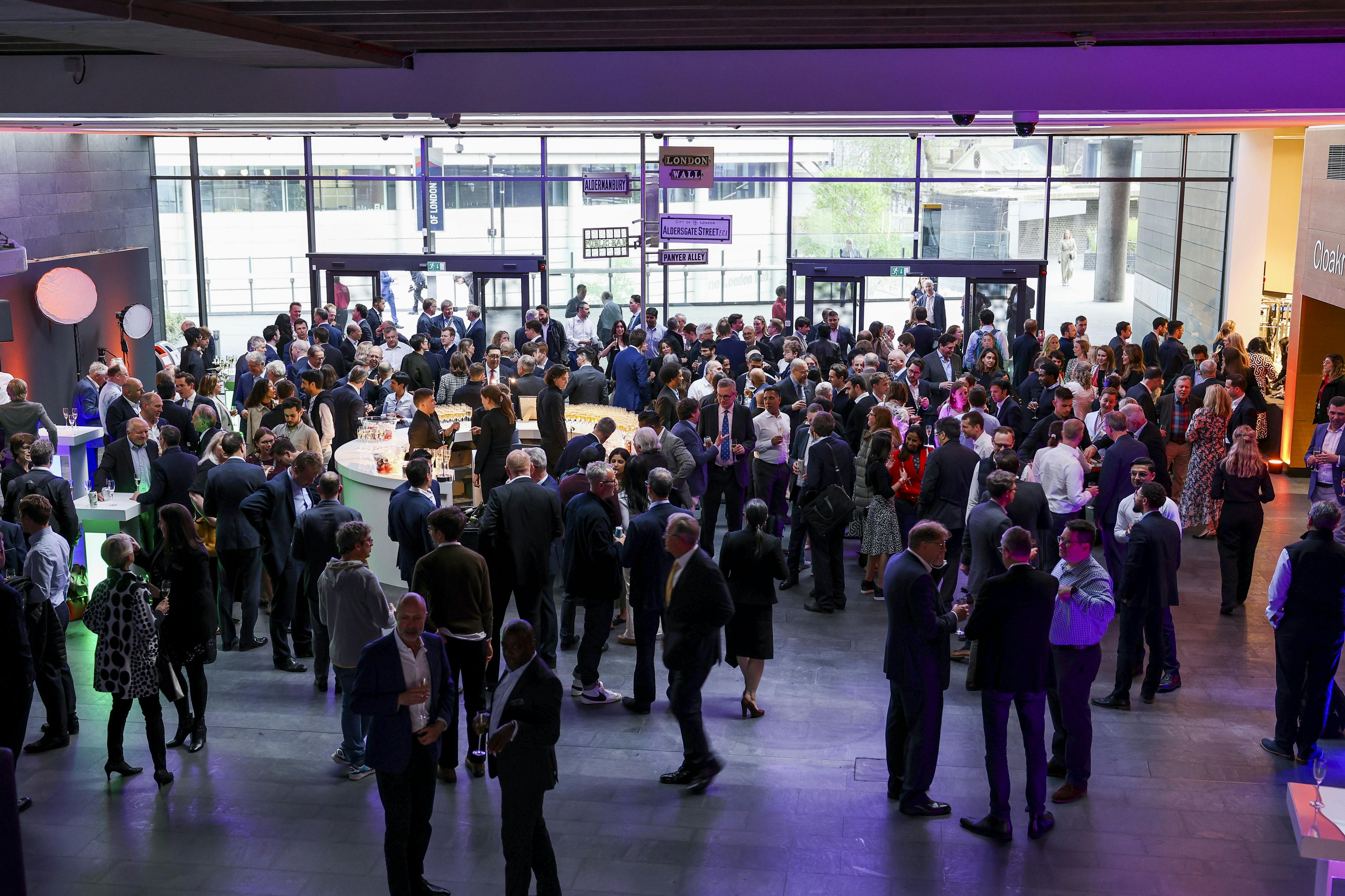 Networking event in London Museum Spaces with modern decor and lively interactions.
