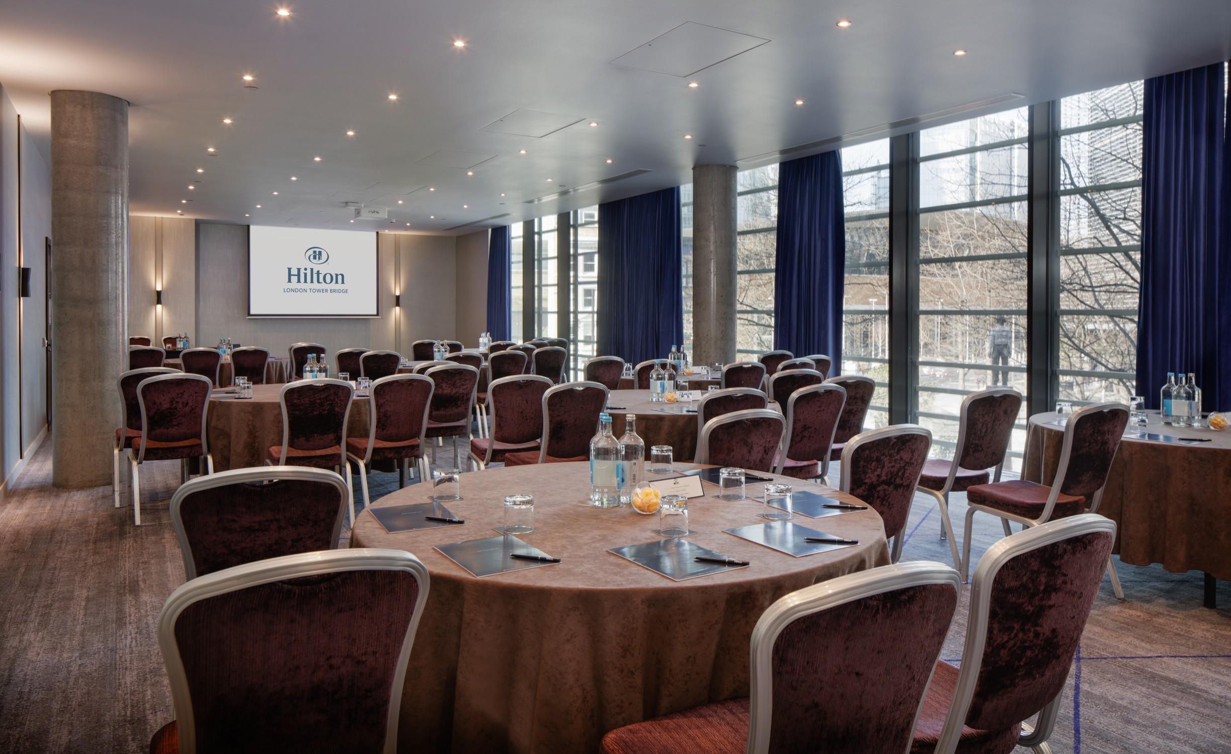 Meeting room at Hilton London Tower Bridge, ideal for corporate workshops and seminars. - Banner