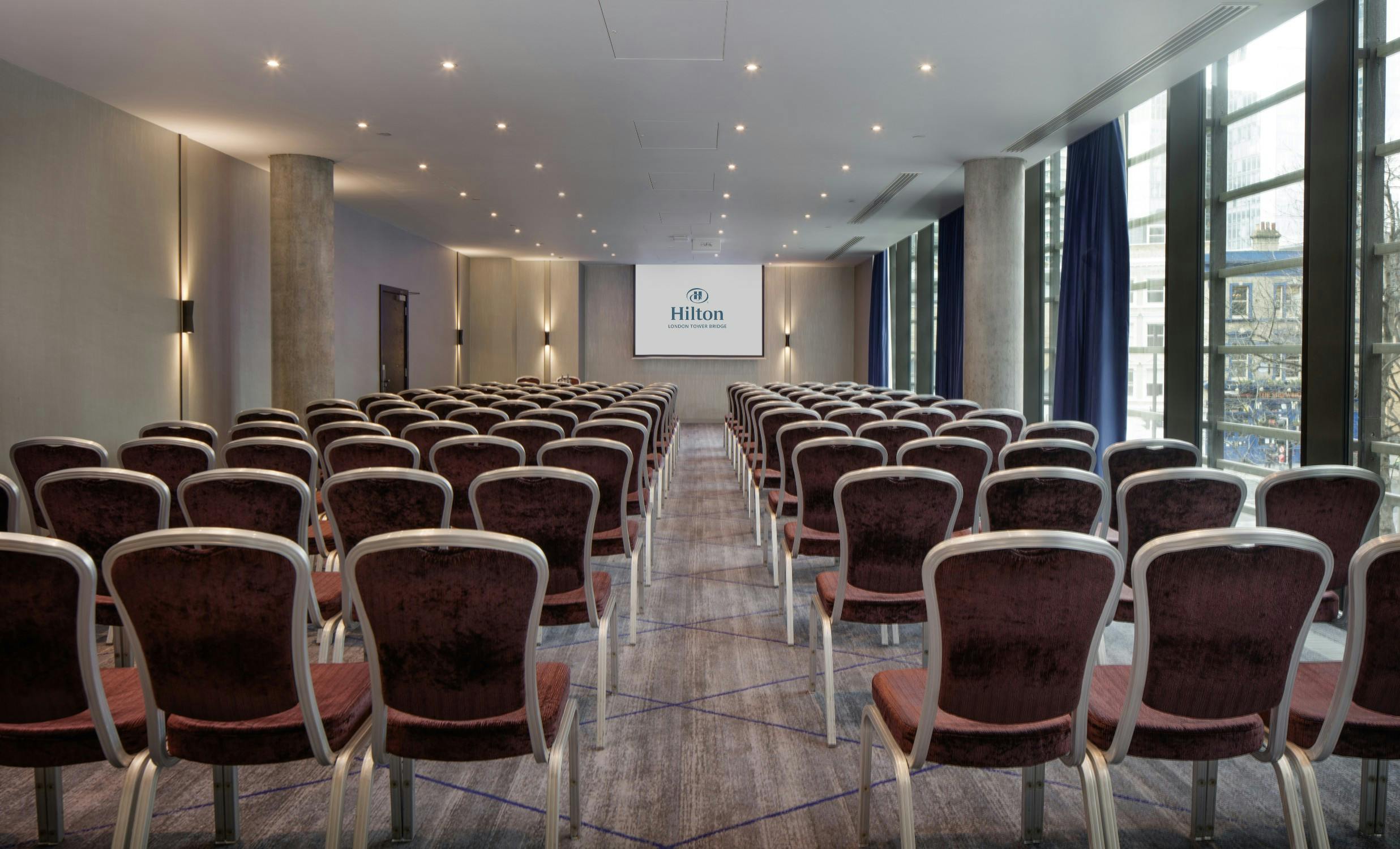 Modern meeting space at Hilton London Tower Bridge, ideal for conferences and workshops.