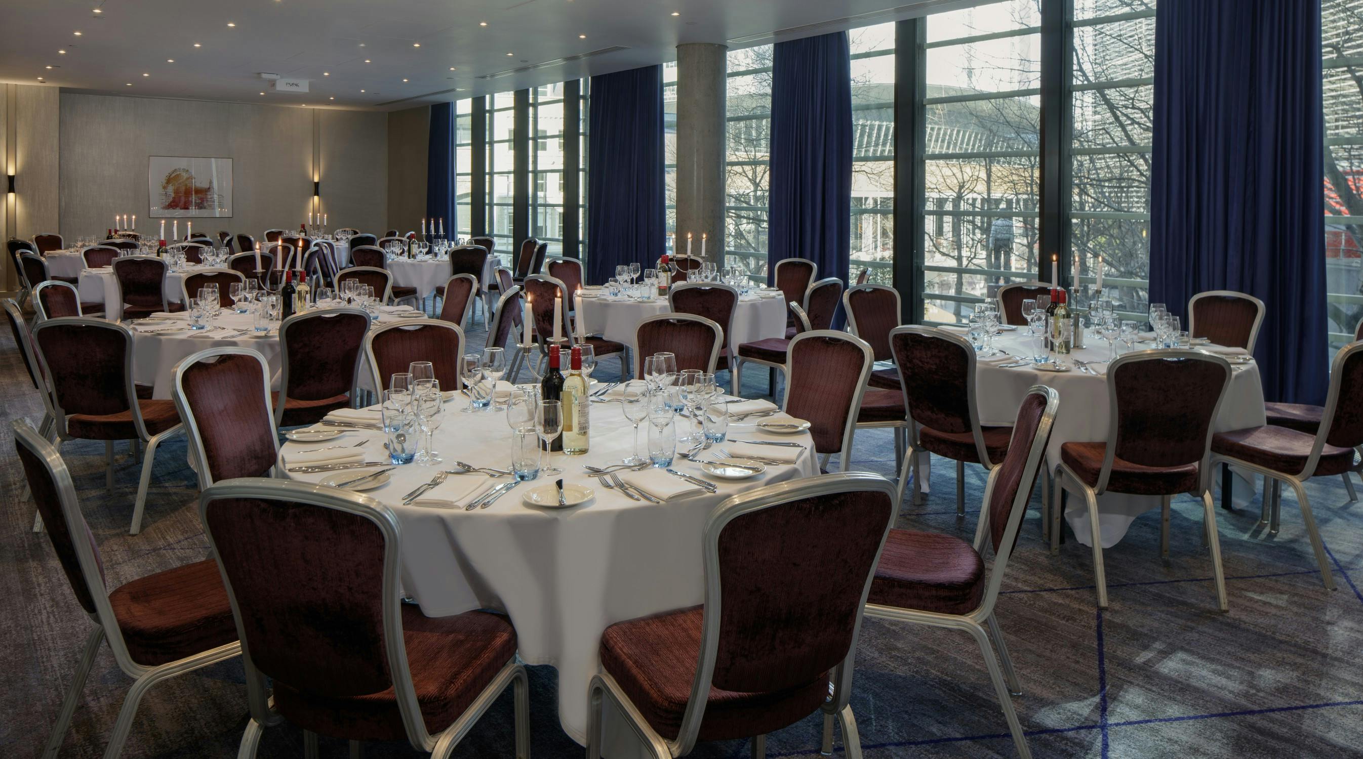 Elegant banquet room at Hilton London Tower Bridge, perfect for corporate dinners and celebrations.