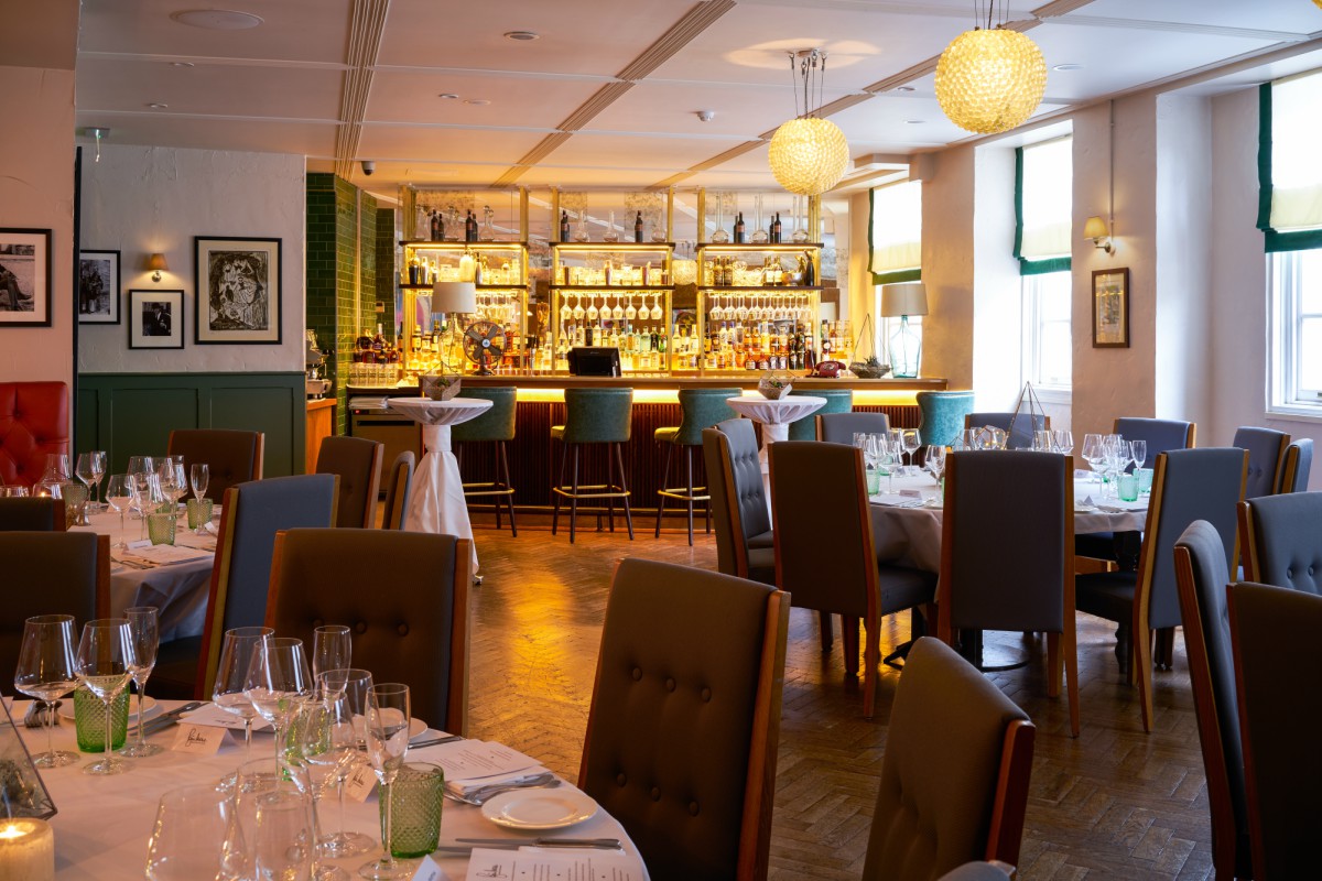 Elegant dining space in The Sir Roger Moore Room, perfect for corporate events and gatherings.