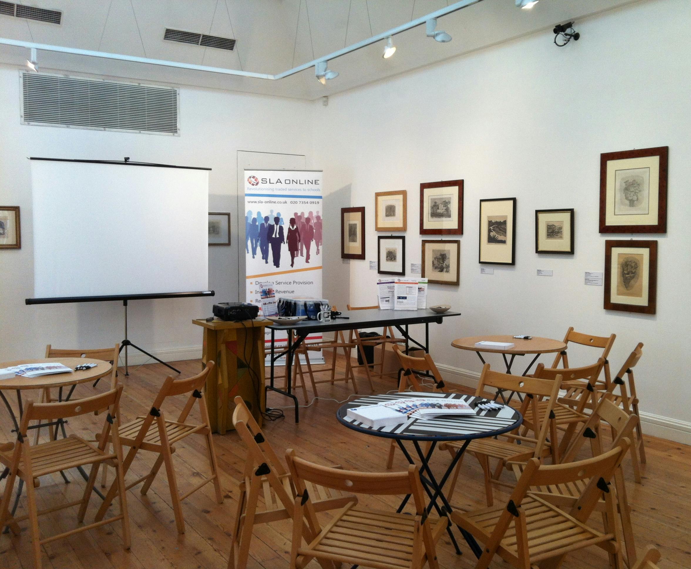 Meeting space at Estorick Collection with screen, ideal for networking events.