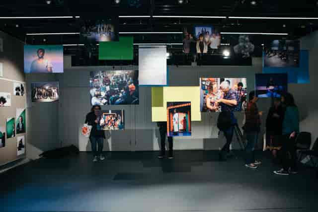 Dynamic event space at Bush Theatre with engaging photo exhibition for networking.