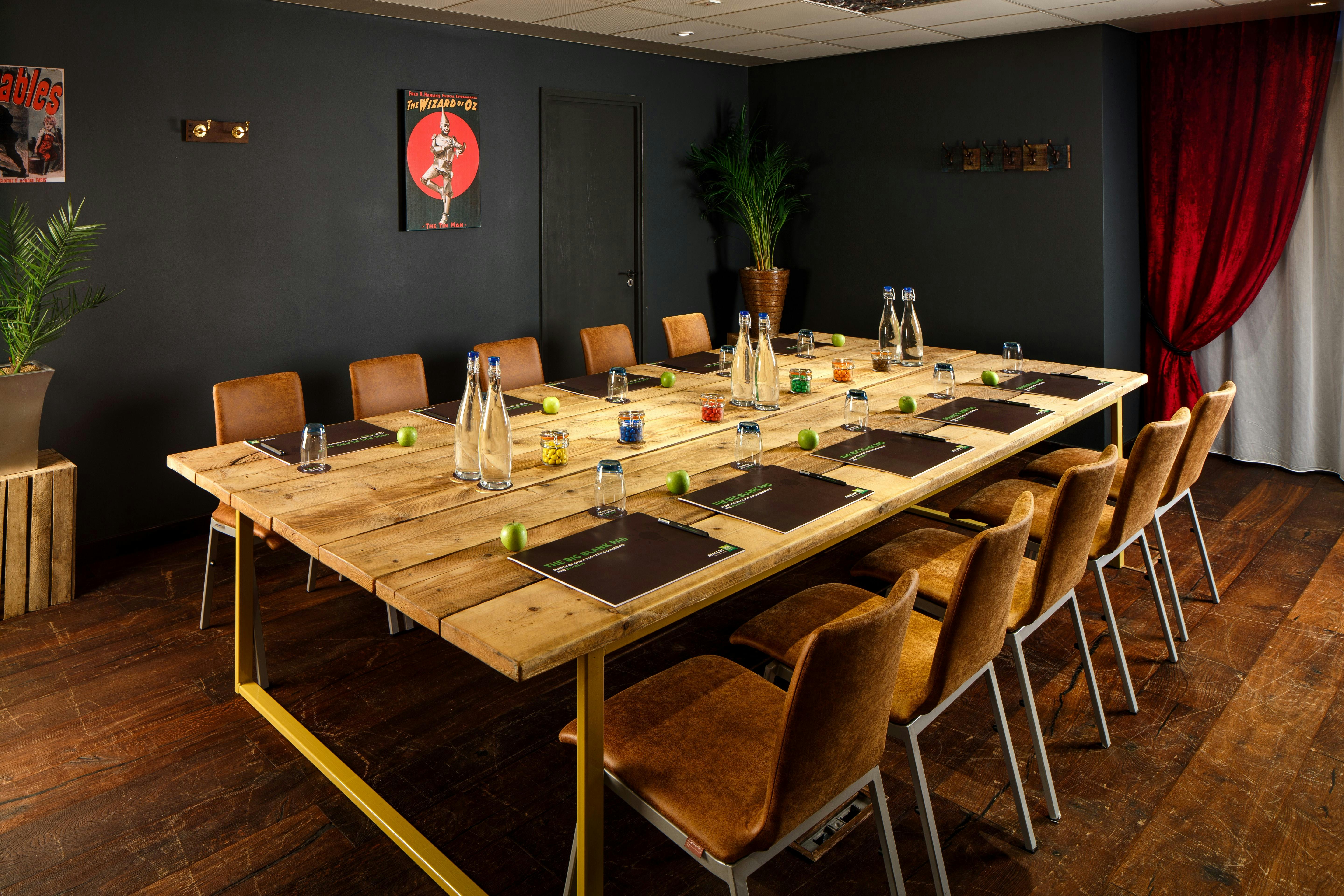 Goble Room at Ibis Styles Southwark: inviting meeting space with large wooden table.