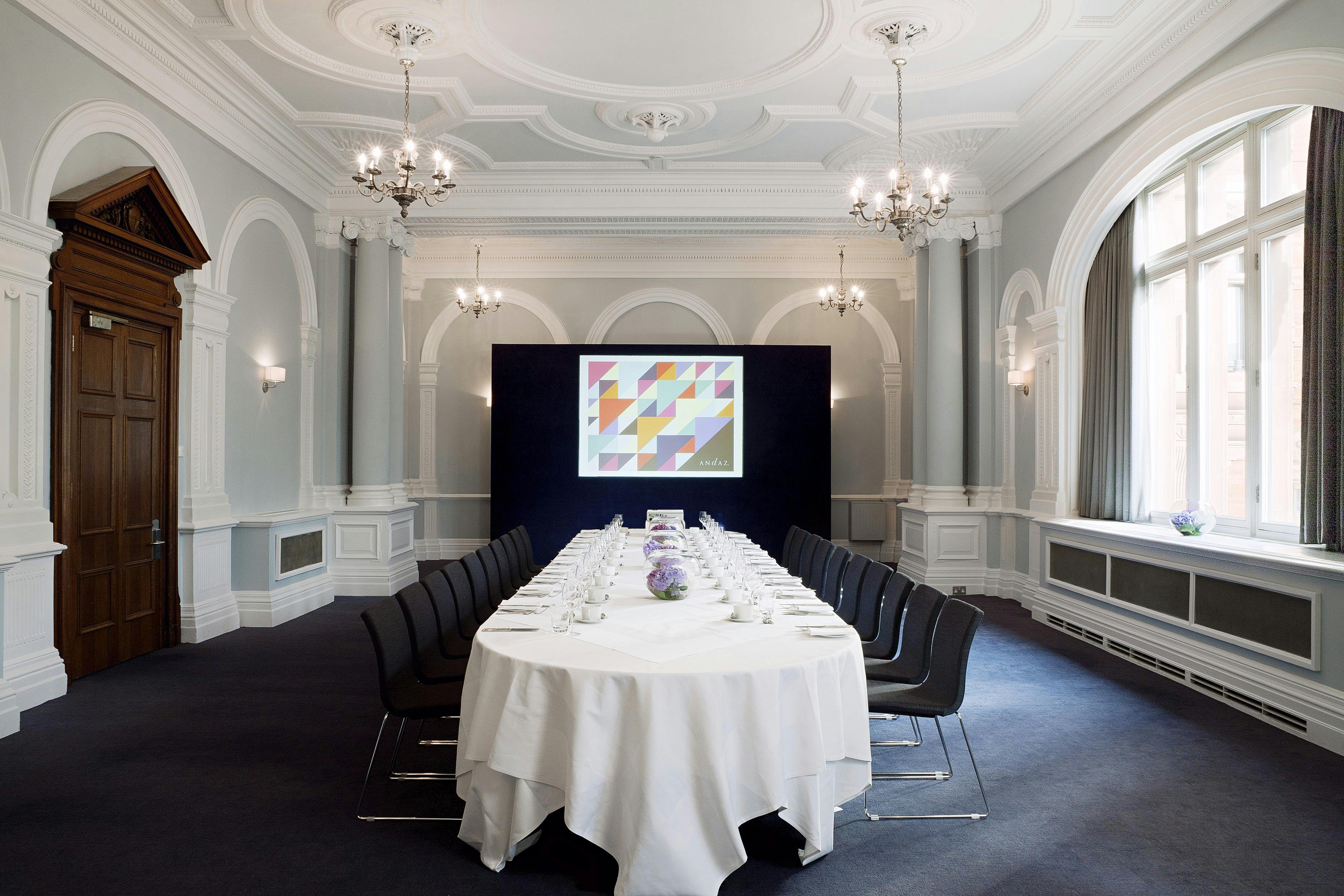 Fenchurch Suite meeting room with oval table, ideal for corporate events in London.