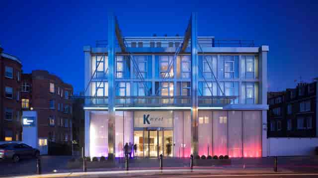 Modern Green Room at K West Hotel, ideal for networking events and conferences.
