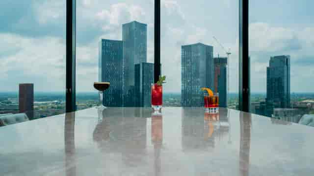 "Cloud 23 event space with skyline view, perfect for corporate cocktail receptions."