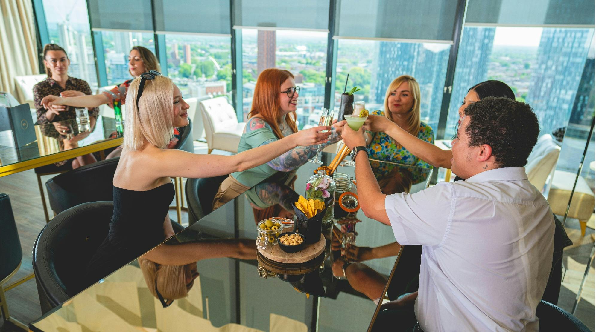Vibrant networking event at Cloud 23, Hilton Deansgate with panoramic views.
