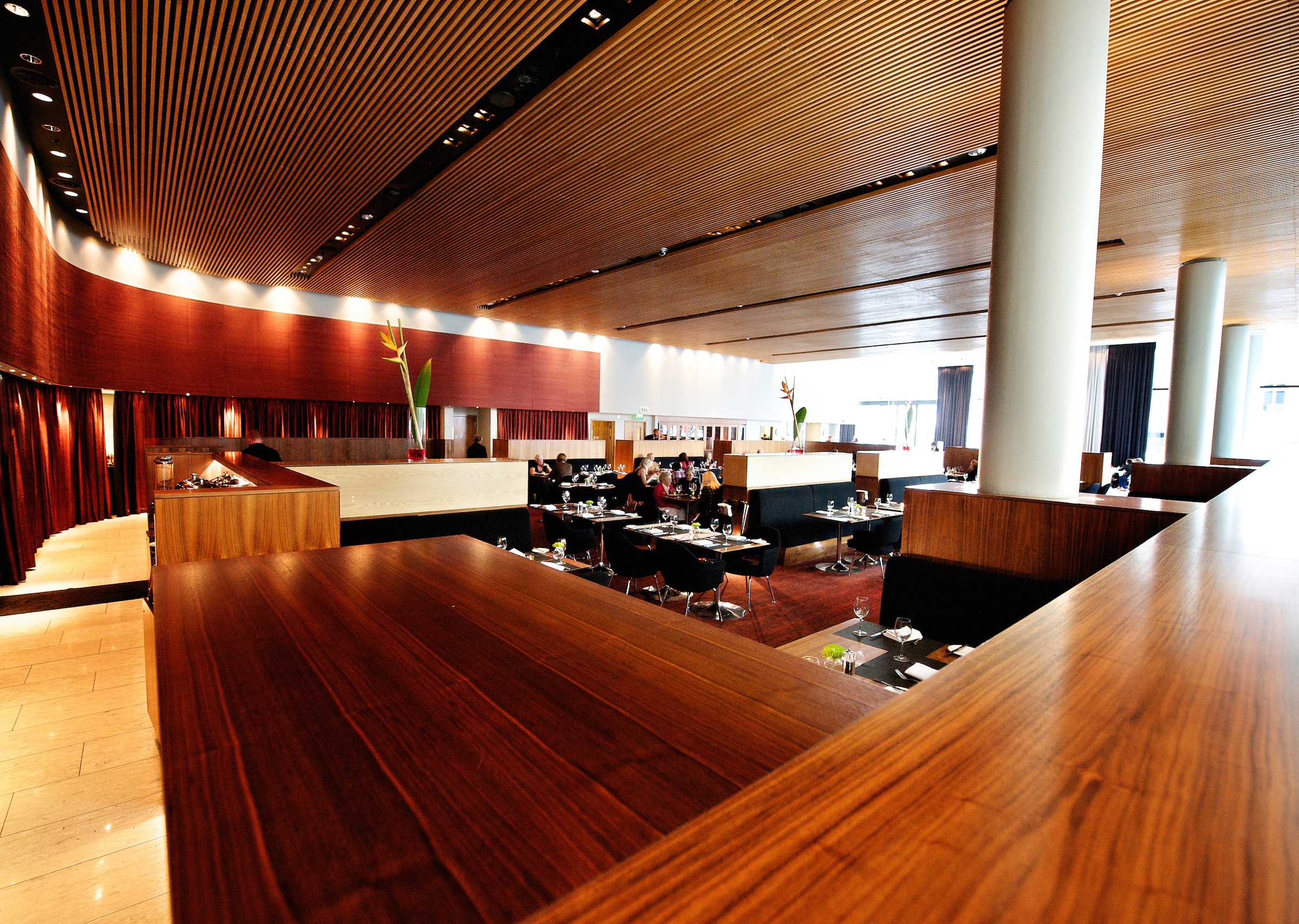 Podium Restaurant & Bar Lounge: modern dining space for corporate events and private gatherings. - Banner