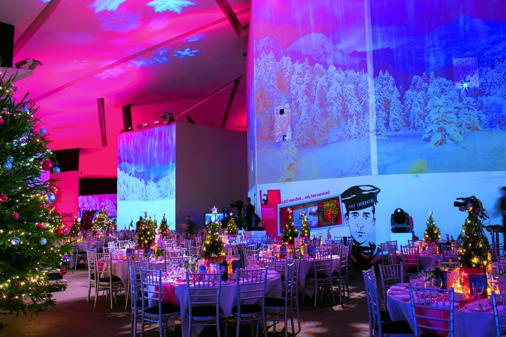 Elegant event space at Imperial War Museum North for corporate holiday parties.