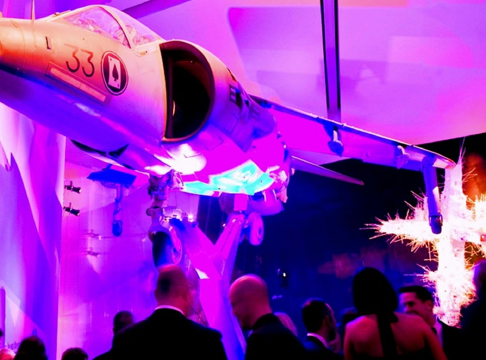 Suspended aircraft event setup at Imperial War Museum North, ideal for immersive experiences.