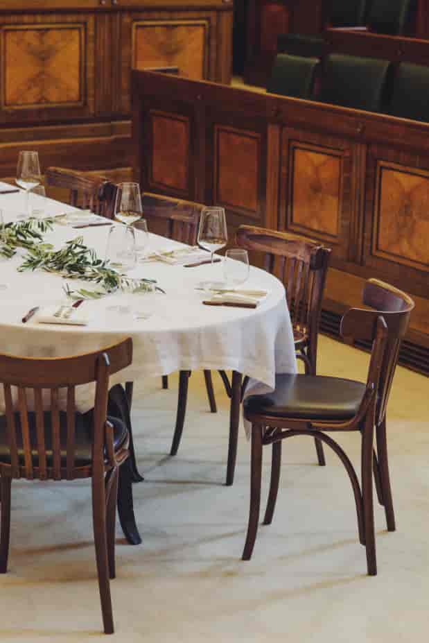 Elegant dining table in Town Hall Hotel's Council Chamber for corporate dinners and gatherings.