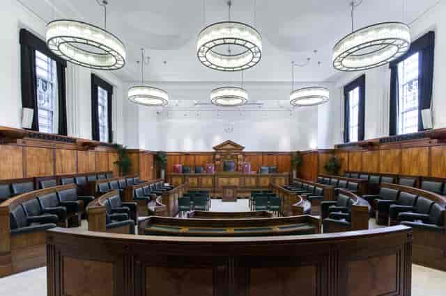 Elegant Council Chamber at Town Hall Hotel, ideal for conferences and panel discussions.