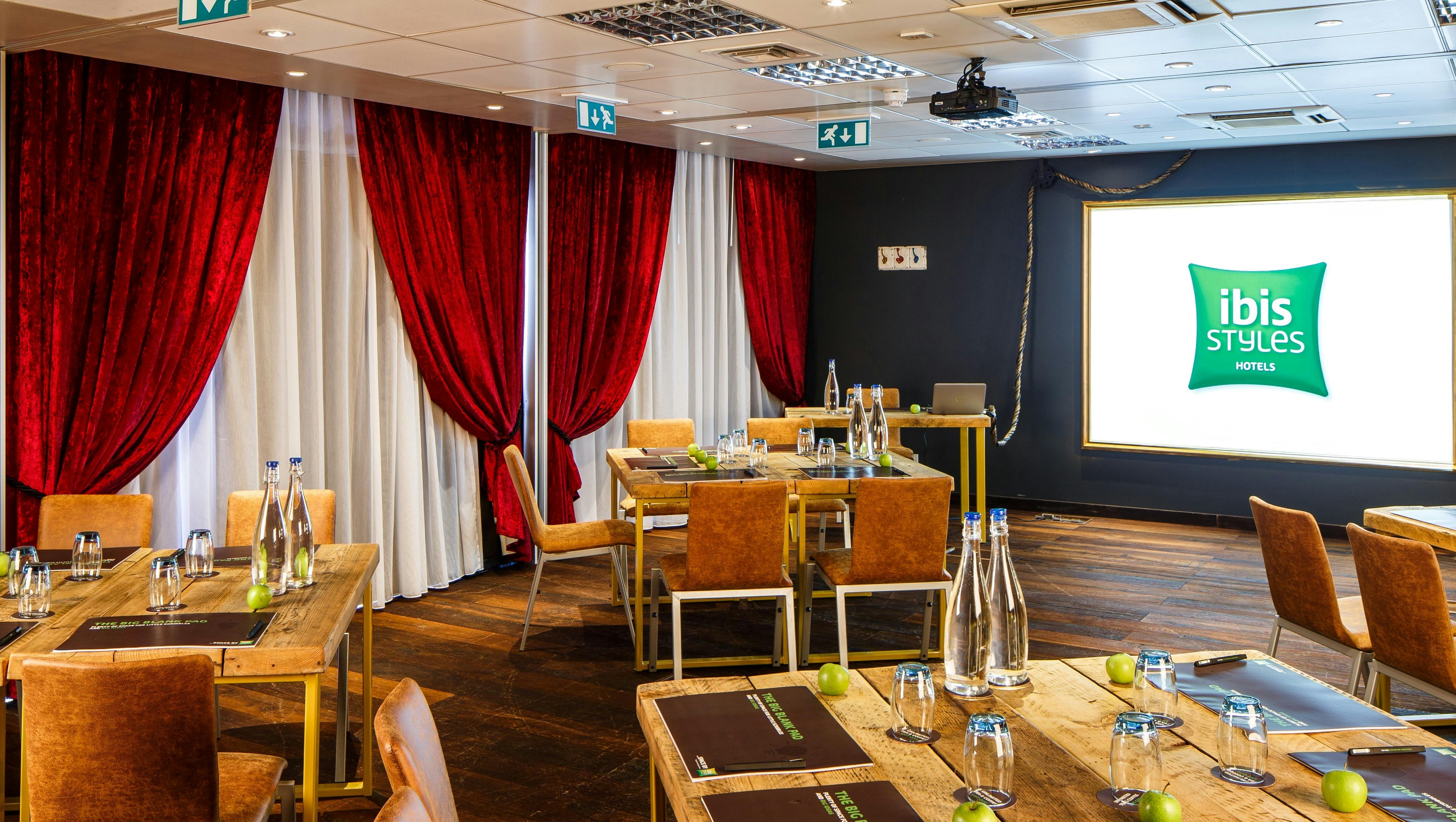 Modern meeting room at Ibis Styles Southwark, perfect for corporate events and workshops.