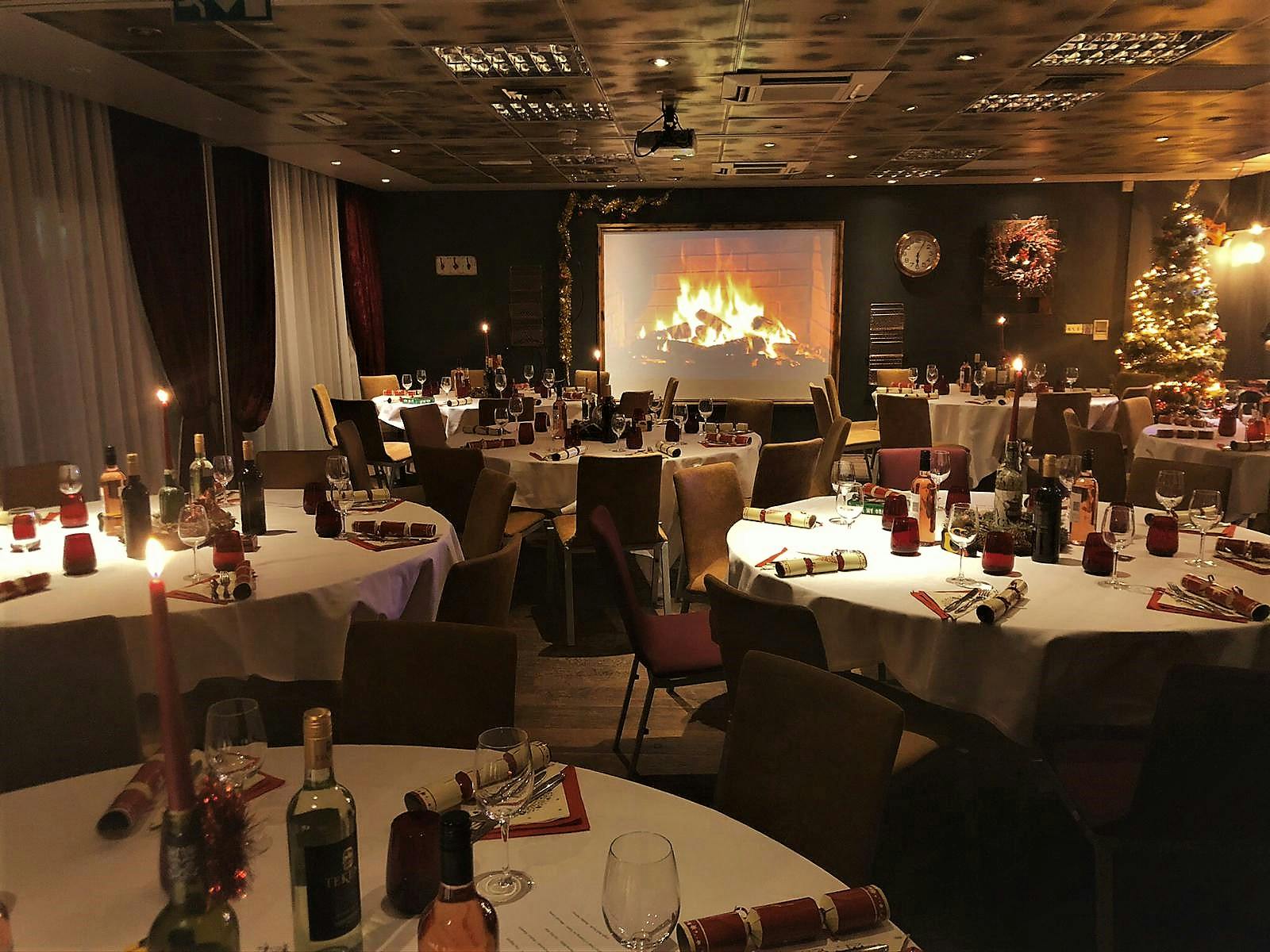 Cozy winter event space with festive decor at Ibis Styles Southwark, ideal for gatherings.