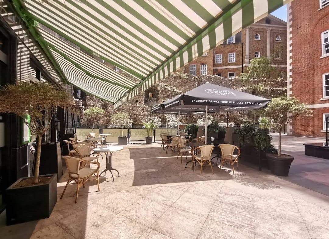 Charming outdoor venue at Leonardo Royal Hotel London City for events and gatherings.