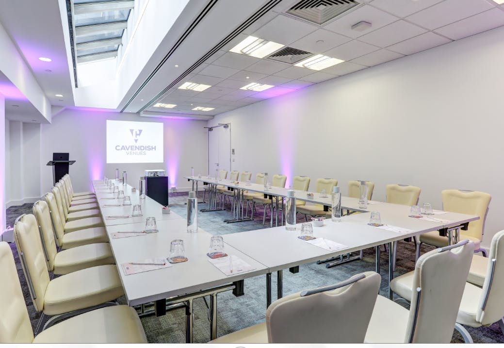 Newgate Suite meeting room with U-shaped table, ideal for corporate events and presentations.