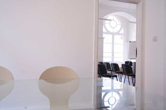 Waterloo Room at Southbank Training: sleek meeting space with glass table, ideal for workshops.