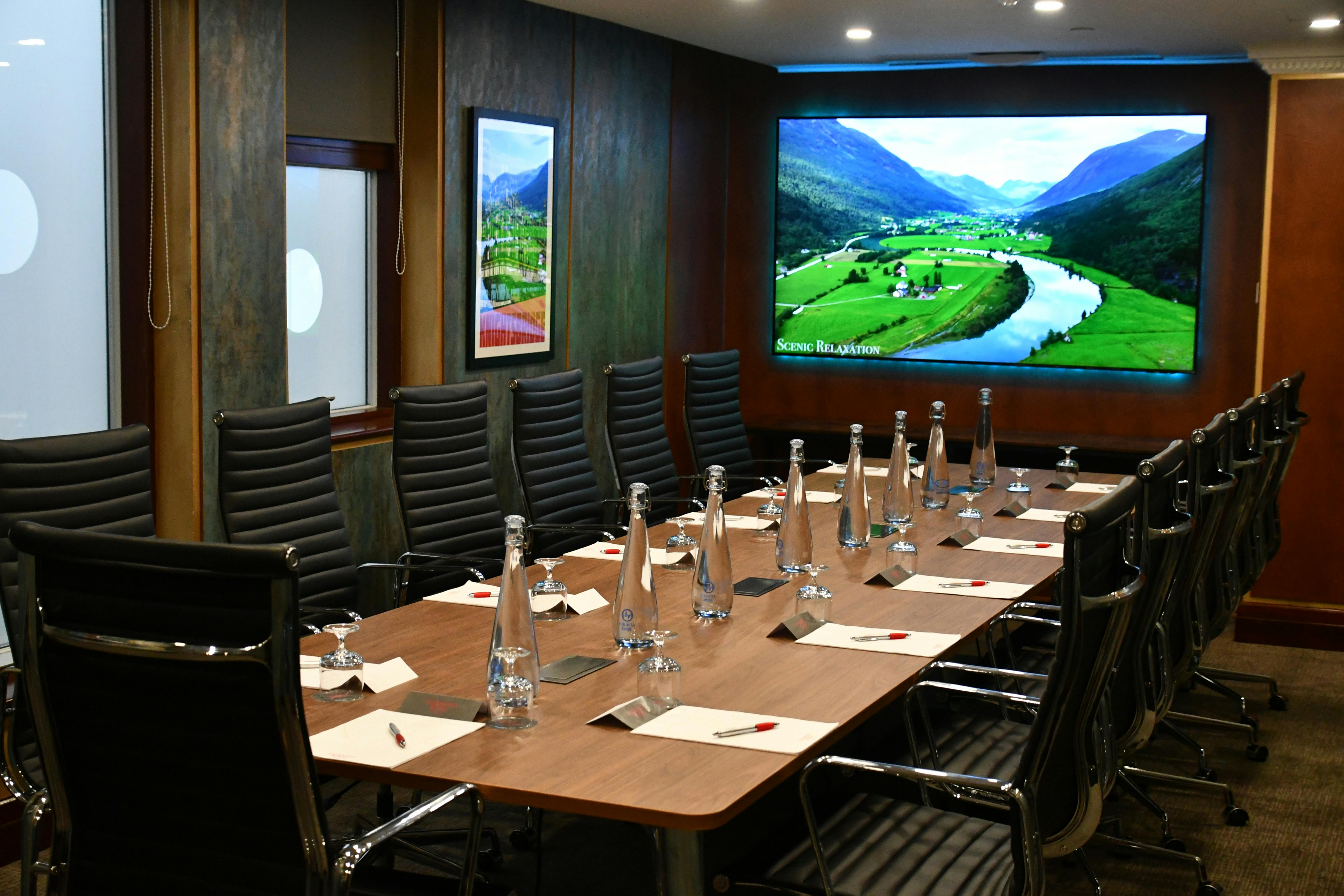 Executive Boardroom at Leonardo Royal Hotel, London - modern conference room for corporate meetings.