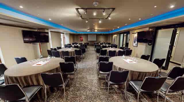 London hotel Crown Suite meeting room, round table, AV