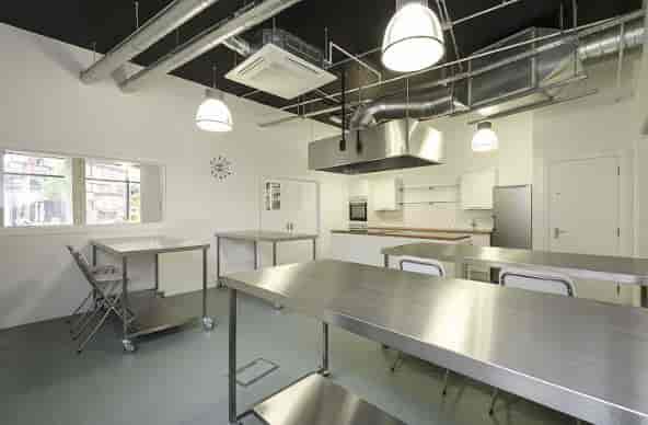 Modern kitchen hire at Jenius Social, featuring stainless steel surfaces for culinary events.