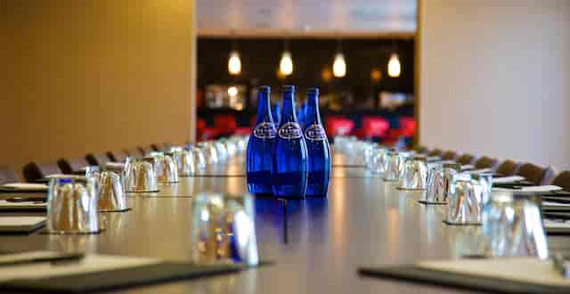 Events Suite at Bermondsey Square Hotel, elegant meeting room with long table setup.