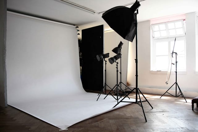 Versatile photography studio with clean backdrop for branding events and video shoots.
