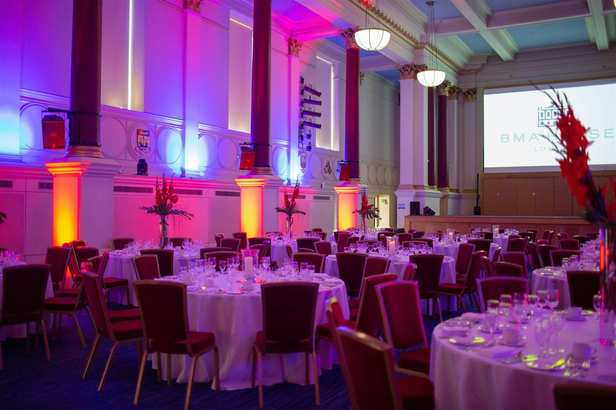 Great Hall in BMA House, elegant dining setup for corporate events and upscale receptions.