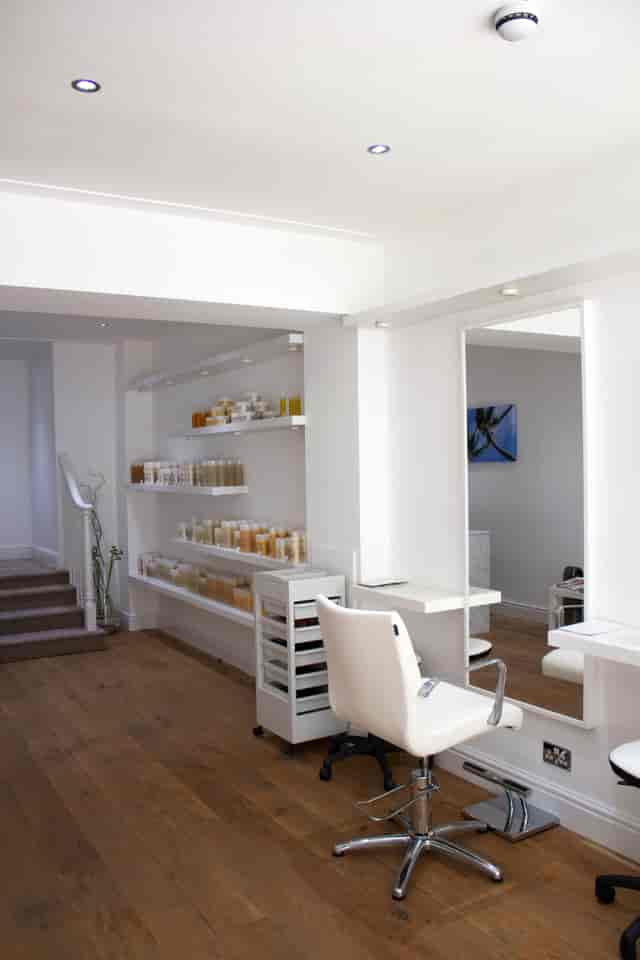 Minimalist wellness venue at 19 Beauchamp Place for corporate events and product demos.