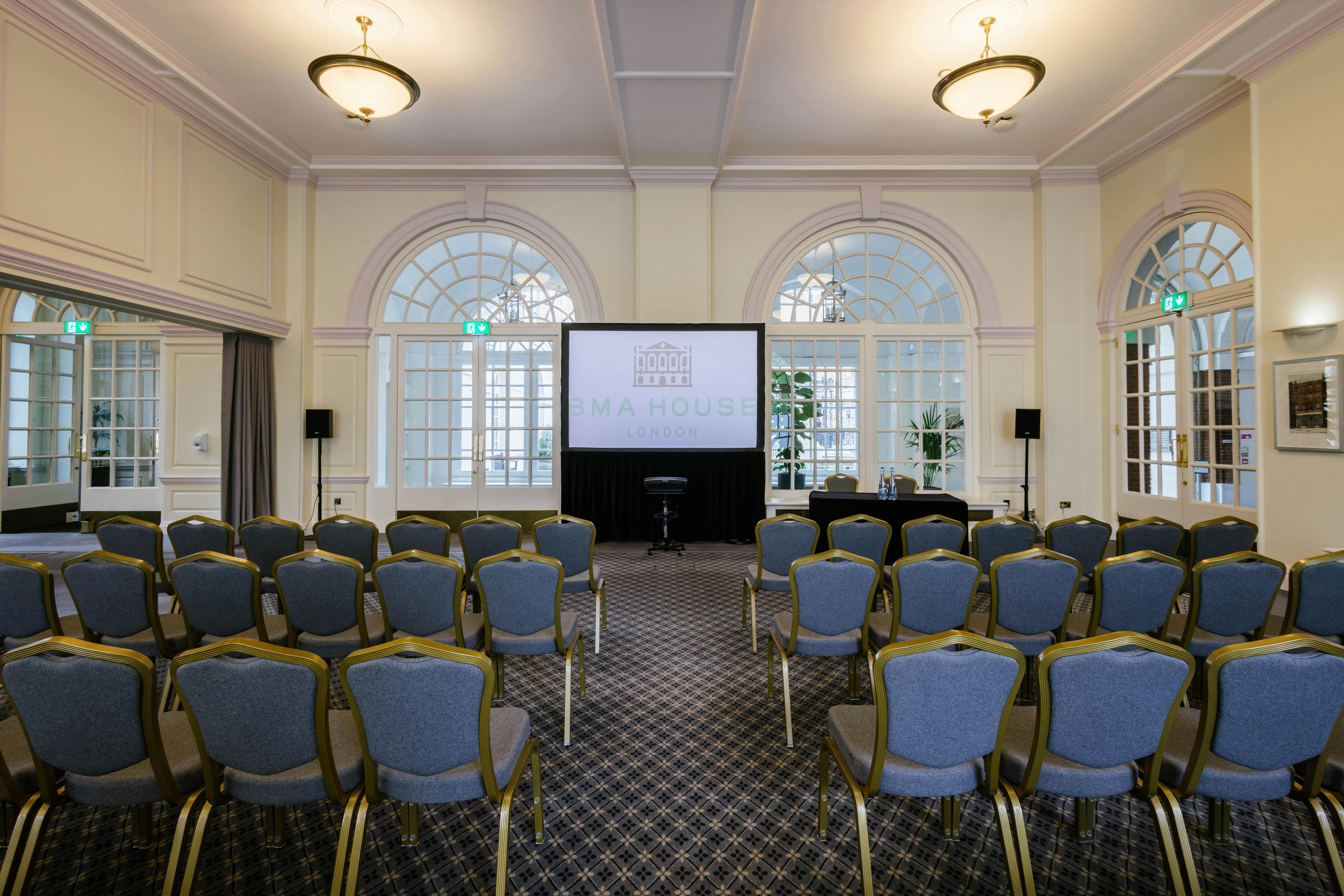 Snow Room in BMA House: elegant meeting space with chairs for corporate events.