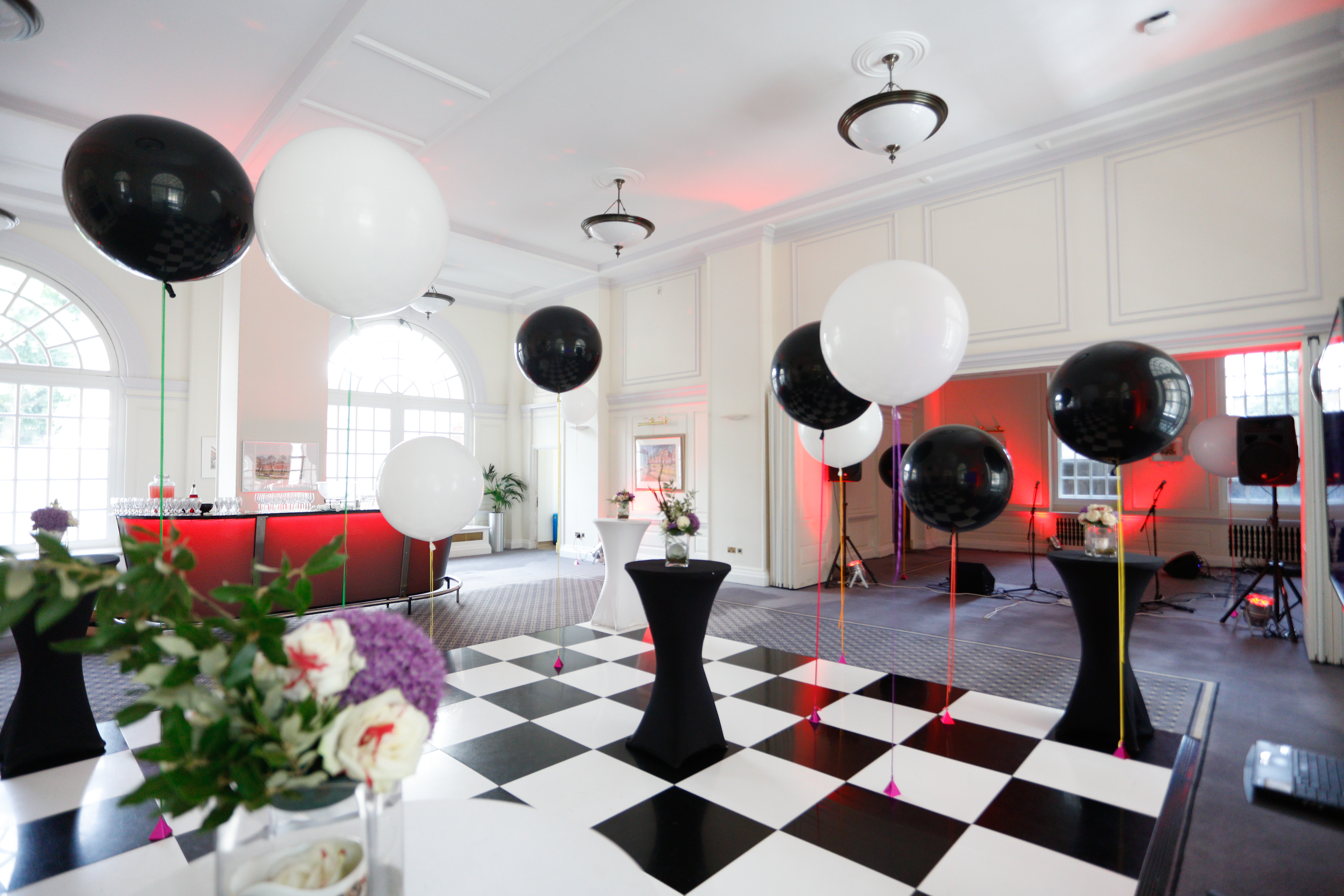Snow Room in BMA House with checkered dance floor, perfect for celebrations and corporate events. - Banner