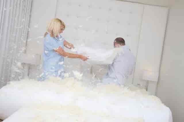 Pillow fight in Lily Loft Suite, Bermondsey Square Hotel - fun team-building event.