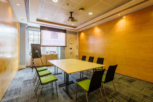 Barnes Room in BMA House: modern meeting space with ergonomic chairs for corporate workshops.