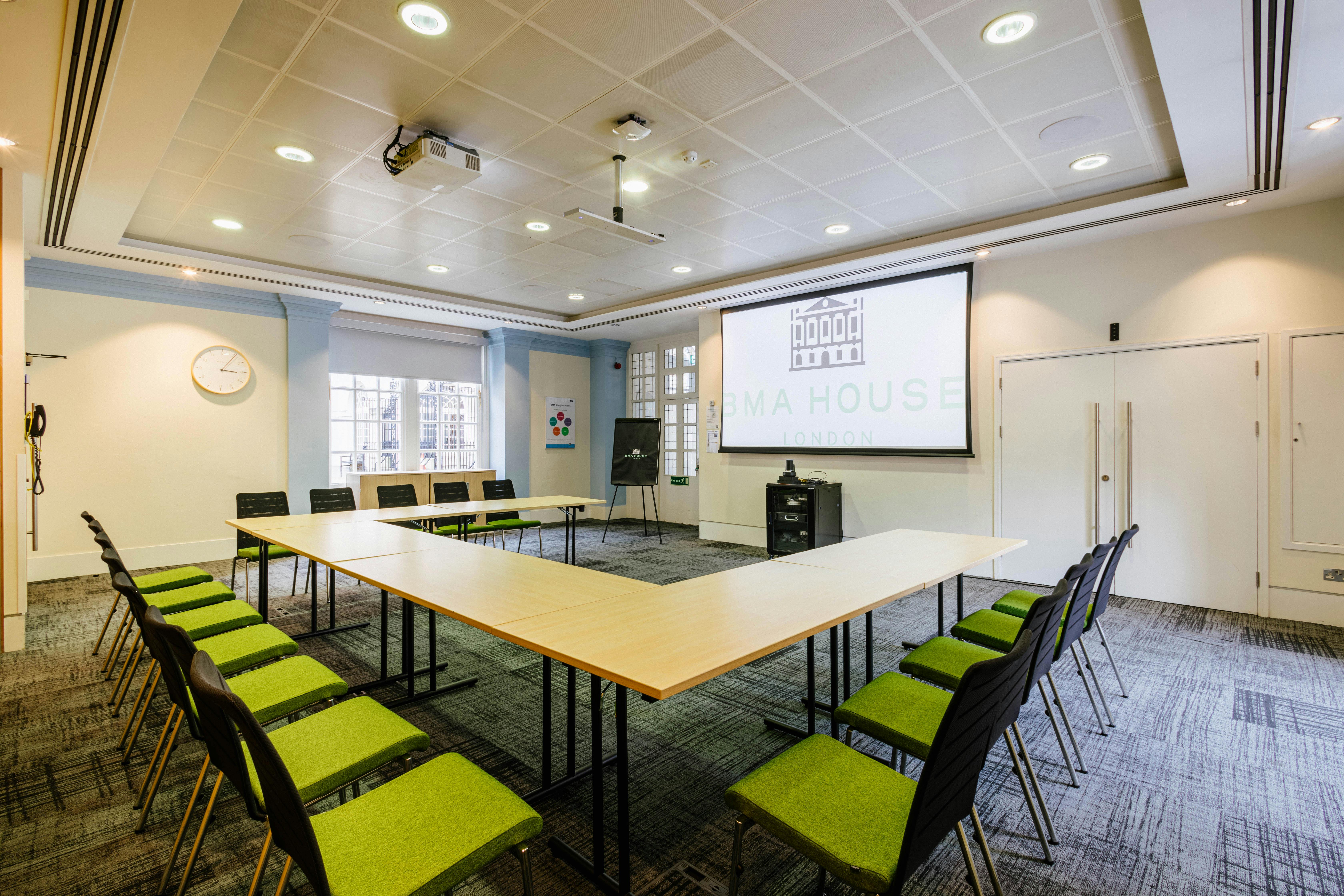 Murrell Room at BMA House: bright meeting space with U-shaped table for events and presentations.