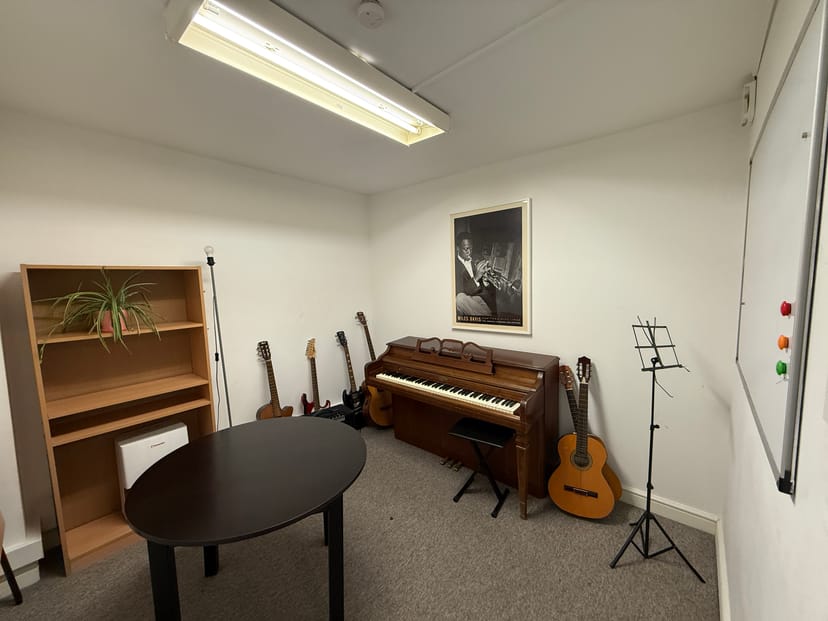 Small Music Rooms at artsHouse with piano, ideal for creative workshops and team-building.