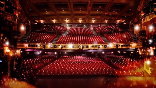 Birmingham Hippodrome auditorium with vacant red seats, ideal for events and performances.