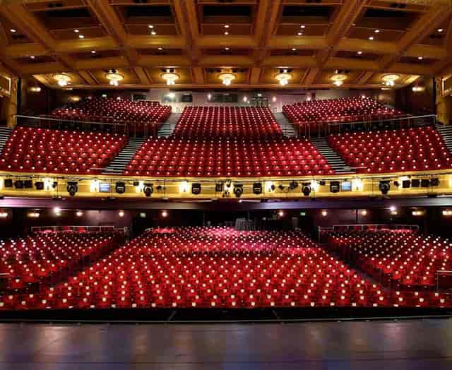 Birmingham Hippodrome auditorium with red seats, ideal for conferences and performances.