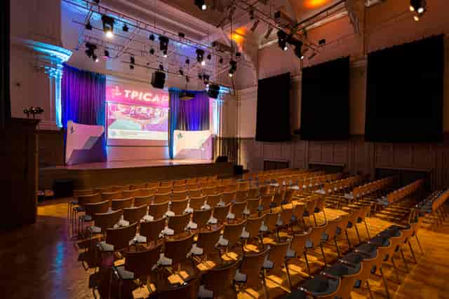 Great Hall at Bishopsgate Institute, tiered seating for conferences and presentations.