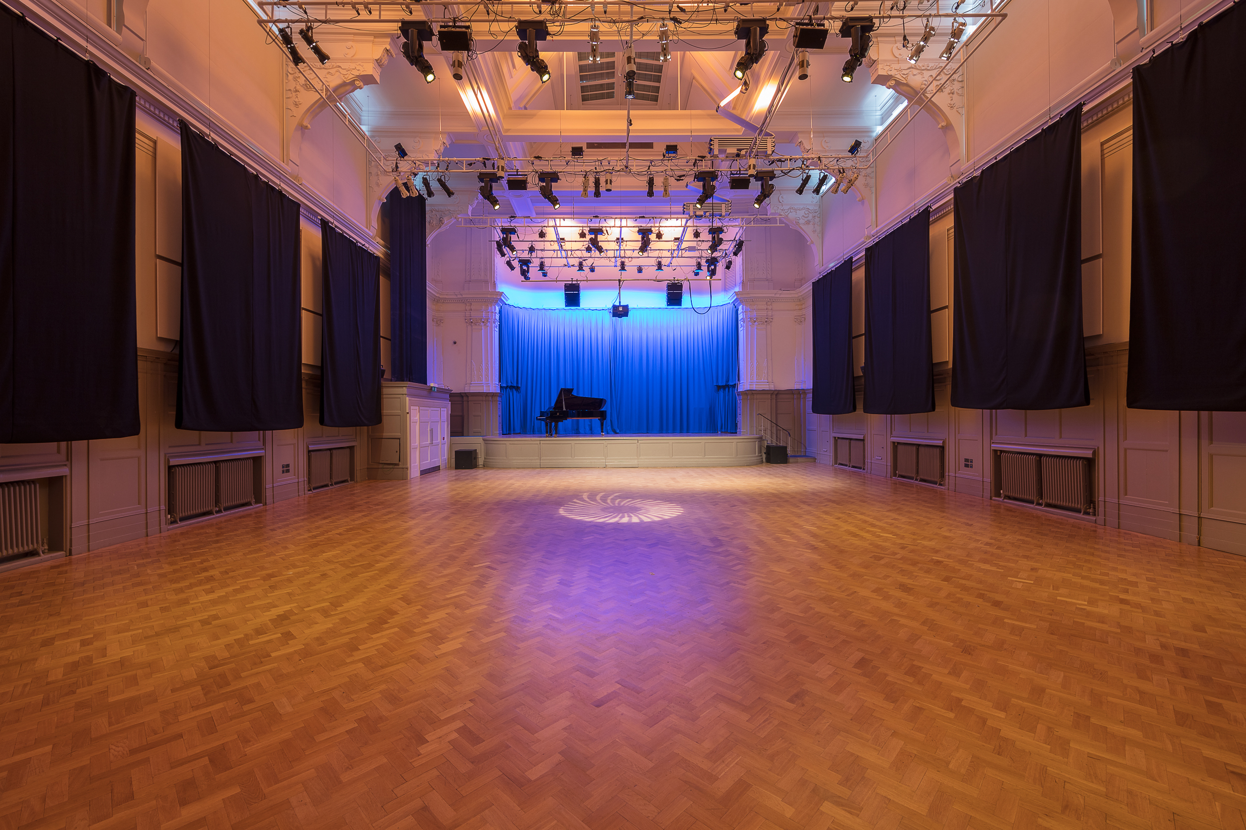 Great Hall at Bishopsgate Institute: elegant venue with polished wood floor for concerts and events. - Banner
