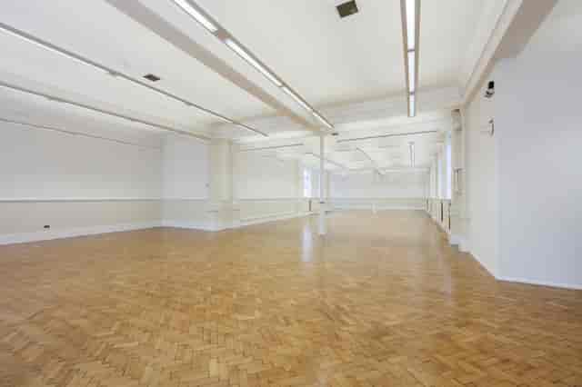 Upper Hall at Bishopsgate Institute: spacious event space with polished wood floors for workshops.