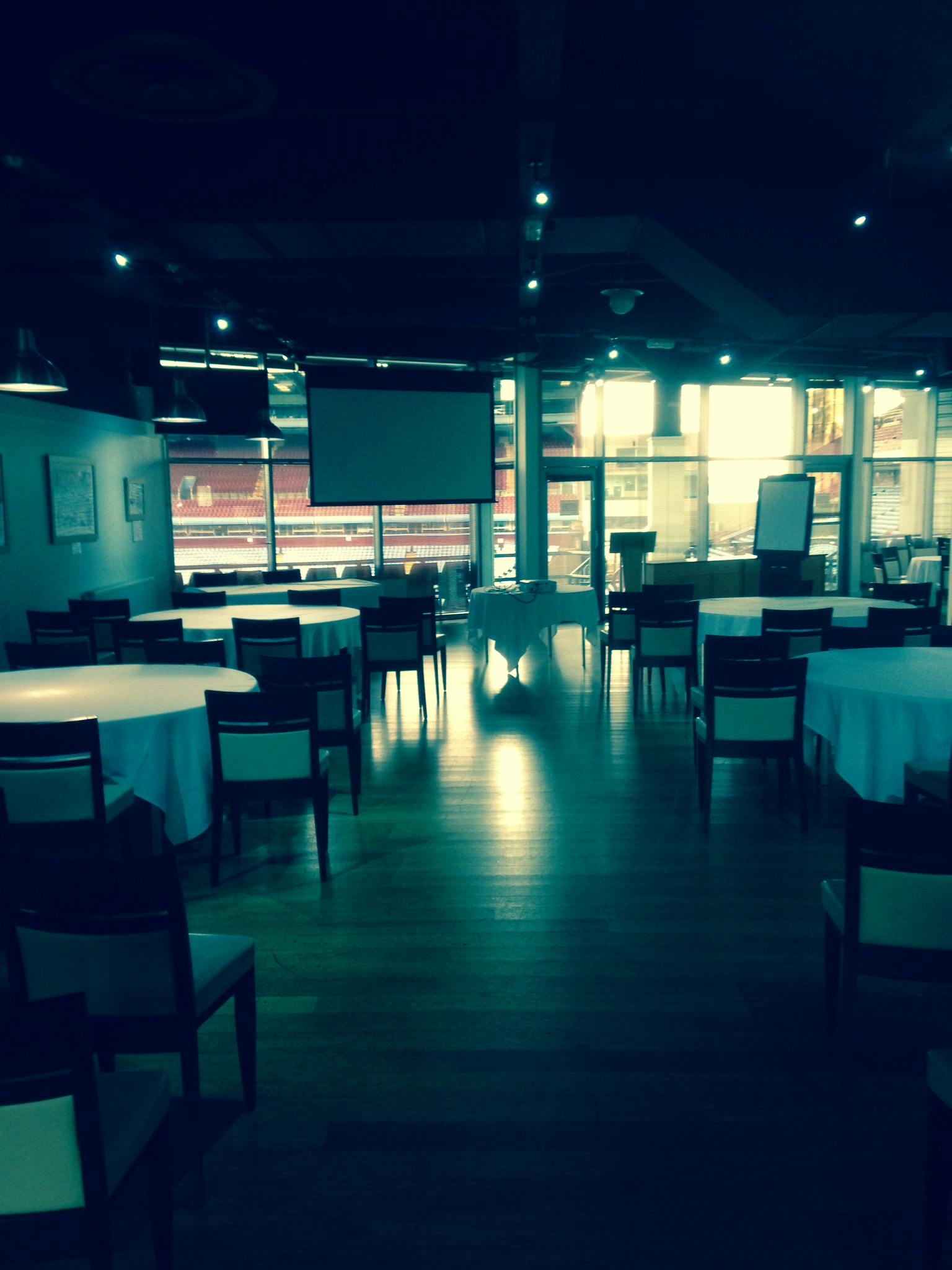 Event space at McGregors, Villa Park, set for corporate meetings with round tables.