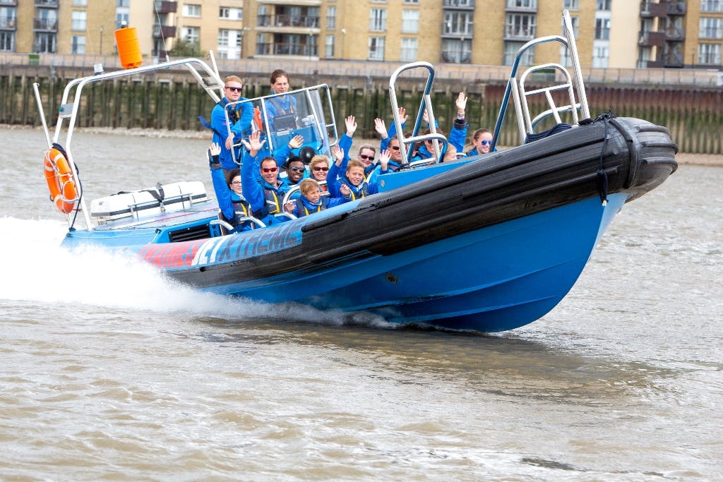 Thamesjet speedboat ride for team-building events with enthusiastic participants.