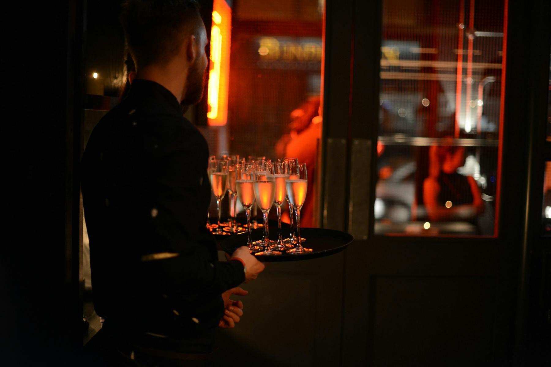 Elegant champagne flutes at HotBox Spitalfields for upscale events and celebrations.