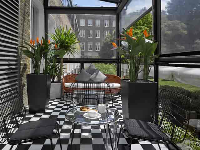 Indoor garden venue at K+K Hotel George for meetings and networking events.
